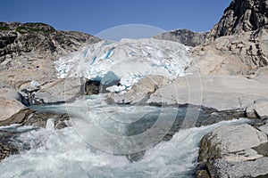 Nigardsbreen glacier and river in the rocky valley