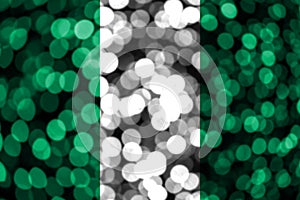 Nigeria abstract blurry bokeh flag. Christmas, New Year and National day concept flag