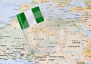 Nigeria flag pin on map photo