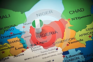 Nigeria marked with a flag on the map photo