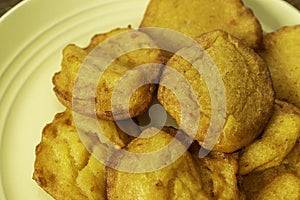 Nigerian Deep Fried Beancake - Akara ready to eat on Yellow Plate