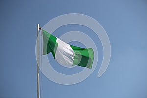 Nigerian flag in the wind photo