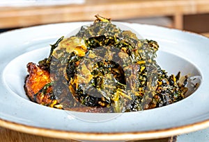 Nigerian Food: Delicious  Efo riro soup  on white plate