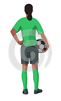 Nigerian women's football girl player stands with her back and holds a ball in hand