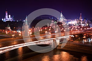 Night aerial panorama to Bolshoy Moskvoretsky Bridge, towers of Moscow Kremlin and Saint Basil Cathedral