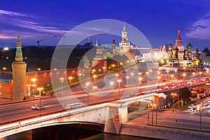 Night aerial panorama to Bolshoy Moskvoretsky Bridge, towers of Moscow Kremlin and Saint Basil Cathedral