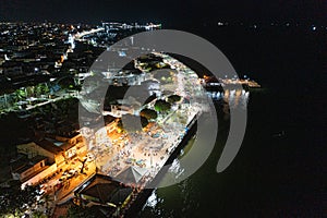 Night Aerial photo of the waterfront of the city of SantarÃÂ©m on the TapajÃÂ³s River, ParÃÂ¡, Brazil. photo