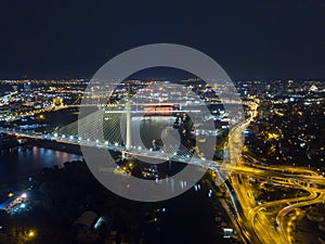 Night aerial view of Ada bridge and surrounding car interchange