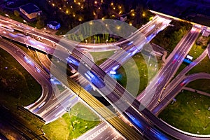 Night Aerial view of a freeway intersection traffic trails in night Moscow