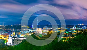 Night aerial view of the Gediminas castle with the lithuanian capital vilnius behind it....IMAGE