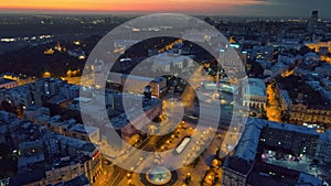 Night aerial view of Kyiv city center. Flying over Independence Square Maidan Nezalezhnosti in Kiev, Ukraine before