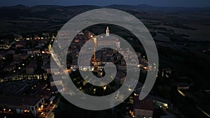 Night aerial view of Medieval Pienza Town in Tuscany, Siena Province, Italy