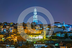 night aerial view of porto dominated by torre dos clerigos tower, Portugal