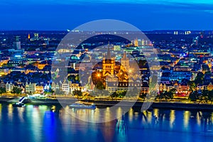 Night aerial view of the riverside promenade and Saint Martin church in Cologne, Germany