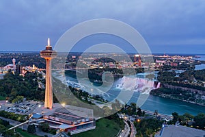 Night aerial view of the Skylon Tower and the beautiful Niagara Falls