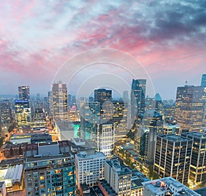 Night aerial view of Vancouver skyscrapers from city rooftop - B