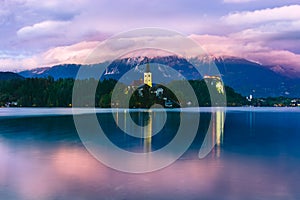 Night at the amazing city of Bled, with beautiful mountains in the background. Slovenia, Europe.