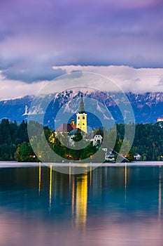 Night at the amazing city of Bled, with beautiful mountains in the background. Slovenia, Europe.