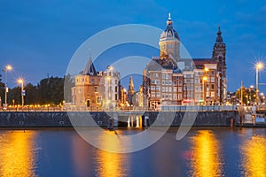 Night Amsterdam canal and Basilica Saint Nicholas