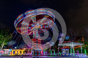 A night at the amusement park, ferris wheel in motion