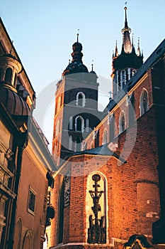 Night Architecture. travel and tourism concept, Poland Bazylika Mariacka. Krakow, Poland. vertical photo