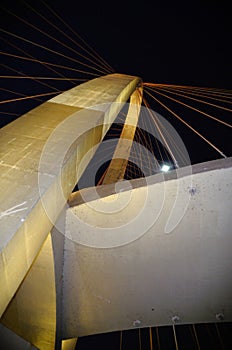 At night, the Arco da InovaÃ§Ã£o taiada bridge and its lighting photo