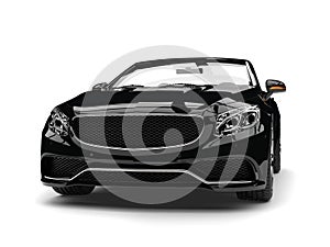 Night black modern luxury convertible car - front view closeup shot