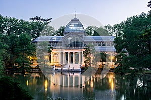 Night blue hour cristal palace in biggest park of madrid capital city