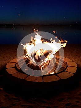 Night bonfire on the beach at Chippewa Lake, Michigan.