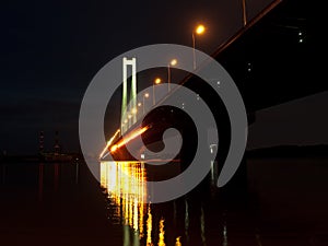 Night bridge on Dnieper river in Kiev, Ukraine