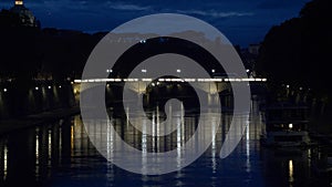 Night on bridge Giuseppe Mazzini and the Fiume Tevere river in Rome Italy