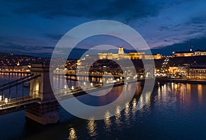 Night Buda Castle and Szechenyi Chain Bridge in Budapest, Hungary. Danube River