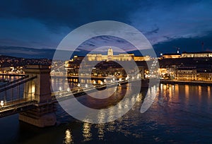 Night Buda Castle and Szechenyi Chain Bridge in Budapest, Hungary. Danube River