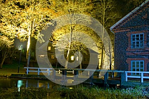 Night building and footbridge photo