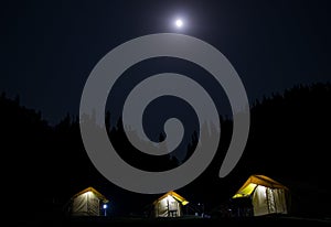 Night camps with moon in Chopta, Uttrakhand