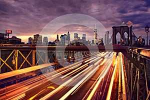 Night car traffic on Brooklyn Bridge in New York City