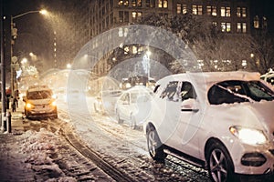 Night car traffic after snow storm in New York City.