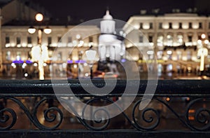 night city architecture streetlight illuminated metal fence close-up blur background Sankt-Petersburg