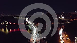 Night city Kiev. Ukraine. Bridge over the Dnieper river.