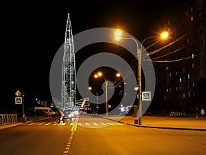 Night city, lanterns and the Lakhta Center skyscraper.