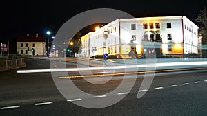 Night city light lines from cars. cars in highway with blur motion. Street view of the modern city at night. A lot of light from