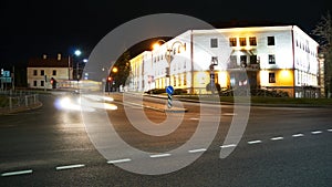 Night city light lines from cars. cars in highway with blur motion. Street view of the modern city at night. A lot of light from