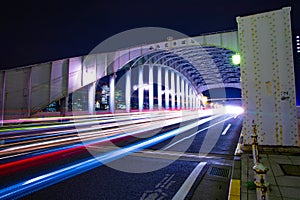 A night city street near Kachidoki bridge in Tokyo wide shot