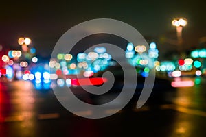 Night city traffic in a giant metropolis.City light bokeh background.Defocused night traffic lights.