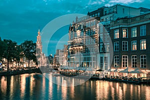 Night city view of Amsterdam canal, and bridge