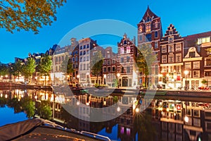 Night city view of Amsterdam canal Herengracht