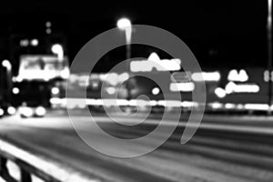 Night city view in blur. City Speed Traffic lights blurry photo. Street life bokeh image. Street with traffic and cars defocused i