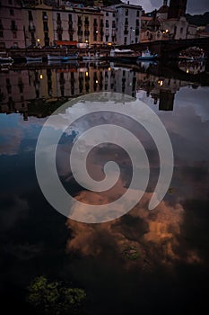 Night city view of Bosa, Sardinia. Cityscape from river.