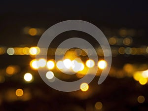 Night city view. Volos city lights upon the Pagasetic Gulf. Greece.