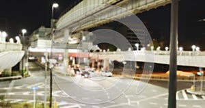 Night cityscape, traffic and train by road, railway or motion blur for transportation infrastructure. Monorail